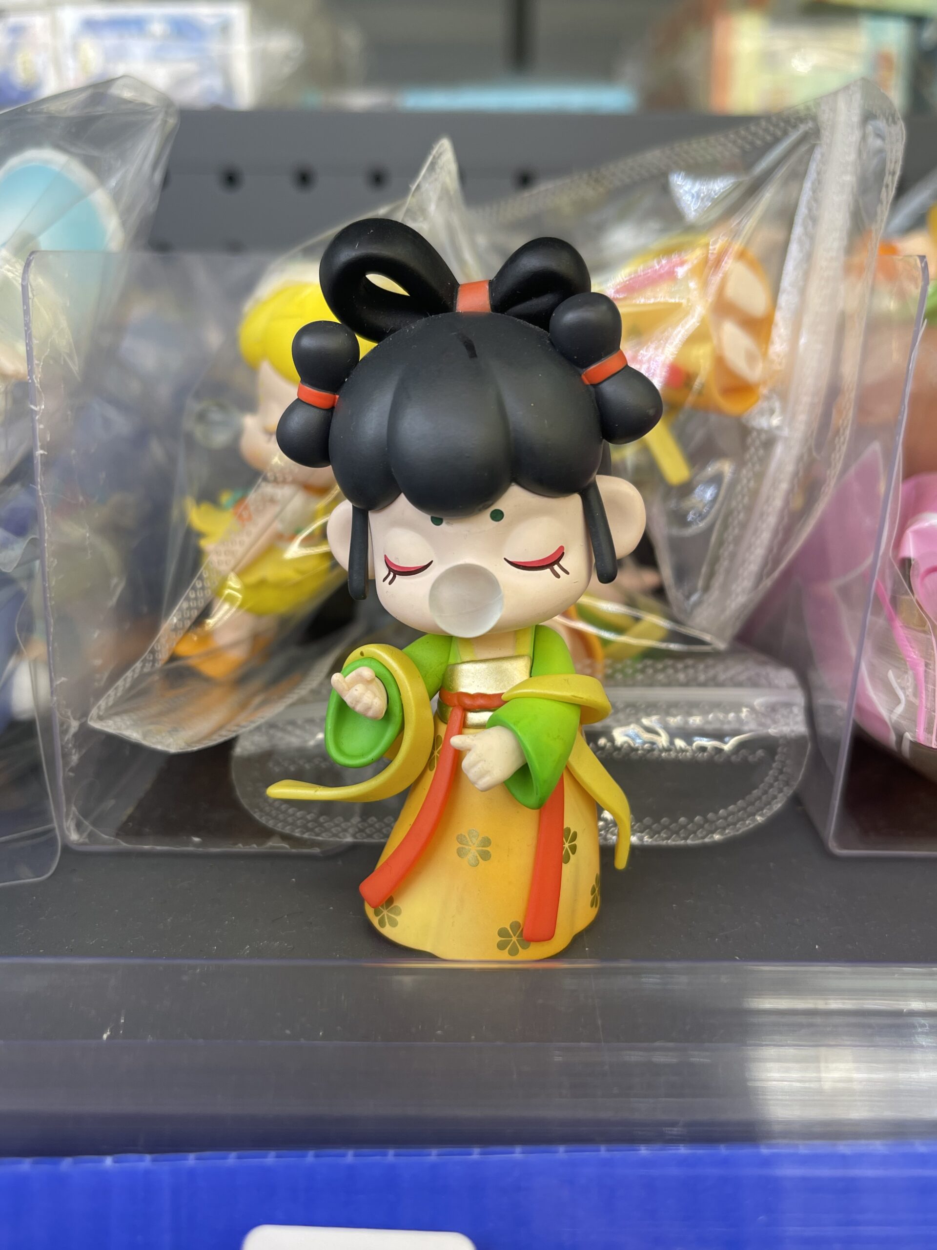 Tang Dynasty Style Girl with Bubble Gum Figurine